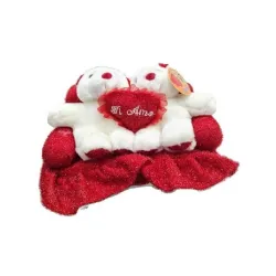 Peluche coppia orsetti bianchi su divano rosso con cuore per San Valentino
